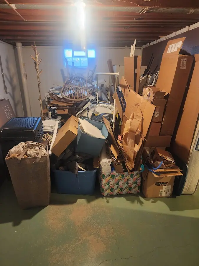 Roll-off dumpster container at job site for 8 Yard Dumpster Rental in Tybee Island